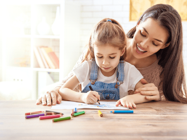 parents trying to boost language development in toddlers by drawing with children at home.