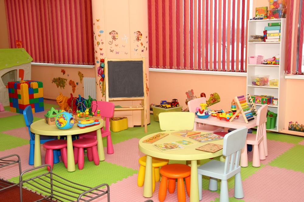 Interior of modern kids playing room in the kindergarten - children's entertainment, recreation, sports, educational games indoor