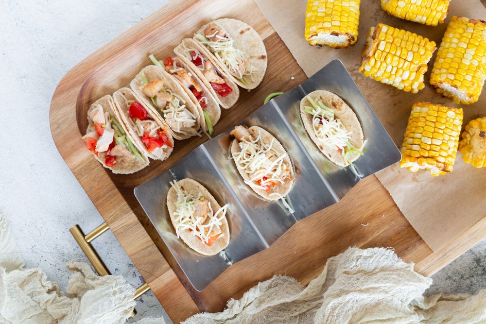 mini tacos, quesadillas, and corn on the cob, wooden tray, finger foods, kids dinner