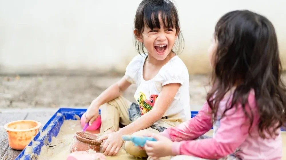 Children participate in fun and educational fall activities at Deecyda Daycare, like leaf collecting and pumpkin painting.